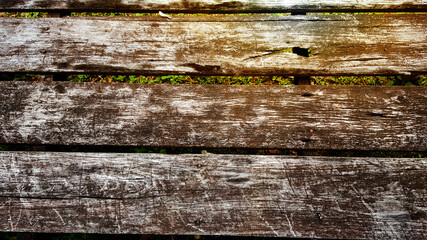 Aged wood planks with black and white patterns of cracked and scars with the gaps, edited with soft...