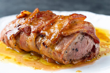 close up of bacon wrapped pork tenderloin
