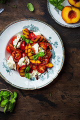 Grilled peach salad with mozzarella and tomatoes