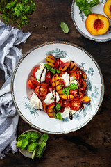 Grilled peach salad with mozzarella and tomatoes