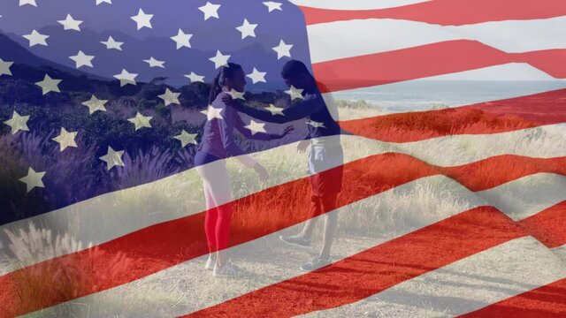 Animation of american flag over african american couple exercising by sea