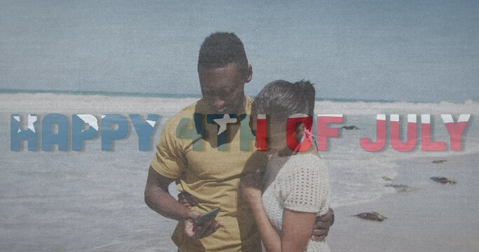 Animation of text independence day over african american couple taking photo at beach