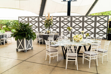 Jewish wedding outdoors with white roses