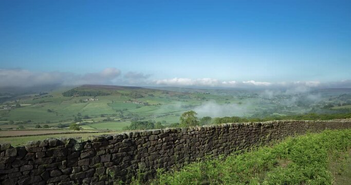 North York Moors Oakley Wall Static Time Lapse, looking across valley towards Castleton, with mist in valley evaporating in morning sun