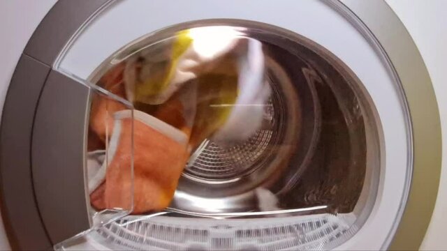 An HD closeup shot of a working dryer machine