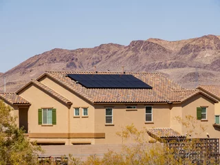 Tuinposter Las Vegas Sunny view of a two stories house with solar panel