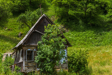 an abandoned old house on the hill
