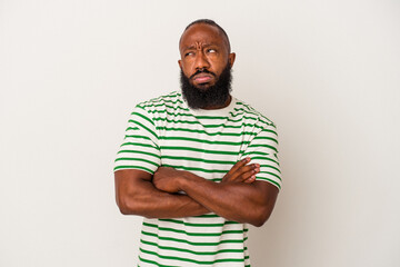 African american man with beard isolated on pink background tired of a repetitive task.