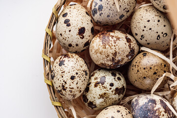 Obraz premium fresh quail eggs on a white acrylic background