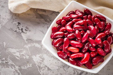 canned red kidney beans on a dark stone rustic background