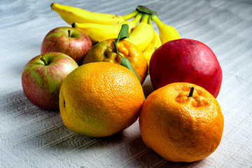 Tropical fruit mix on a table with white tablecloth