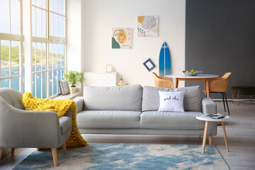 Interior of modern room with surfboard