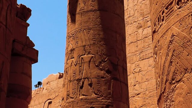 Various hieroglyphs, signs and symbols depicted on  the pillars inside Karnak Temple in Luxor, Egypt. 