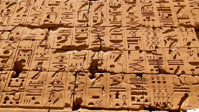 Various hieroglyphs, signs and symbols depicted inside the Karnak Temple in Luxor, Egypt. 