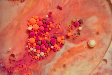 Bright and colorful abstract background from acrylic paints and oil mix, Macro bubble photography for wall art. Acrylic paint and oil mix forming Bubble colorful.