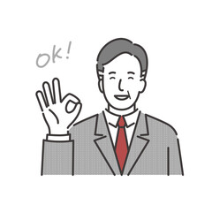 笑顔でOKサインを出すミドルシニアのビジネスマン