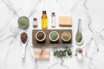 Composition with henna powder and cosmetics on light background