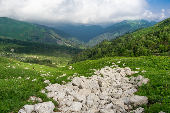 landscape, mountain, sky, nature, forest, mountains, green, trees, hill, clouds, tree, summer, view, grass, blue, jungle, valley, cloud, rainforest, travel, countryside, park, environment, scene, trop