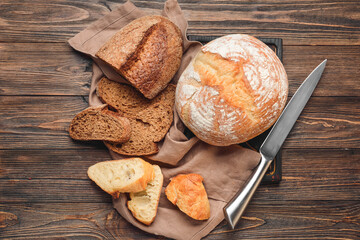 Fresh bread on wooden background