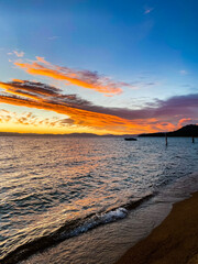 sunset over the sea with boat