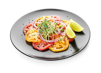 Plate with tasty tomato carpaccio on white background