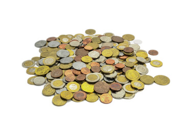Coins of different countries and different denominations on a white background