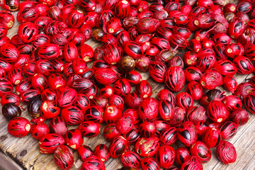 Fresh nutmegs in red mace on sale at a spice market stall at St George's on the caribbean island of...