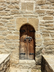 Antique wooden door in the old city in Baku, Azerbaijan