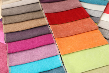 Fabric samples of different colors as background