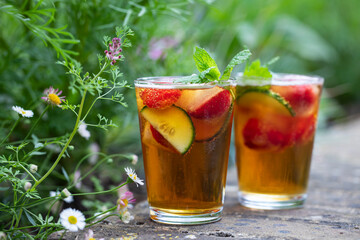 Traditional english cocktail of pimms and lemonade - obrazy, fototapety, plakaty
