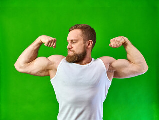 Office plankton goes in for sports. Caucasian shows the muscles in the shirt.