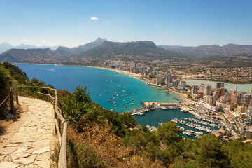 Spectacular panoramic top view of the resort town in Spain Calpe from the famous rock - Penon de Ifach, overlooking the coast, harbor, port, lake and city.