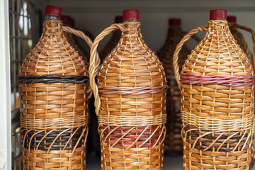 bottles, wine jugs, jars braided with rattan wood vine