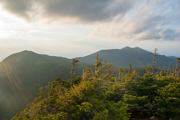 Sun going down over mountain range
