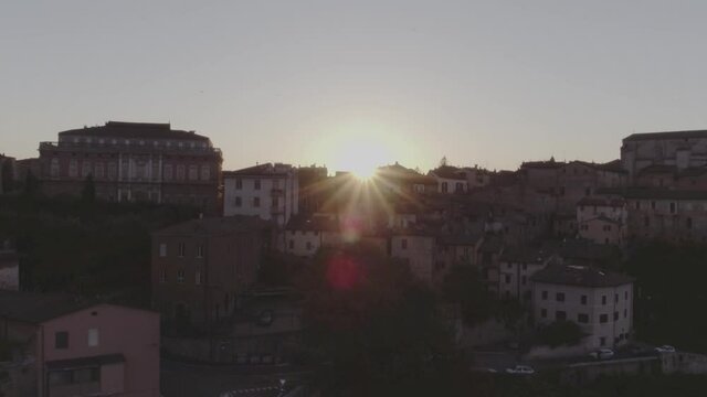Aerial footage drone view of sunset in Perugia, Umbria, Italy, old town // no video editing
