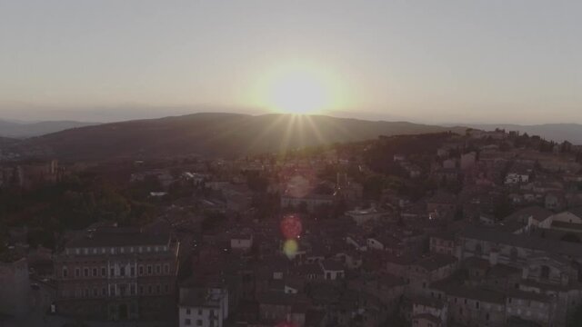Aerial footage drone view of sunset in Perugia, Umbria, Italy, old town // no video editing
