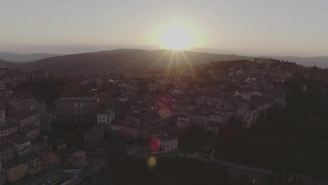 Aerial footage drone view of sunset in Perugia, Umbria, Italy, old town // no video editing
