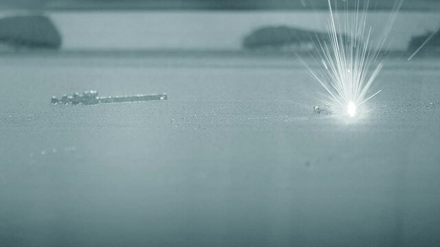3D printer prints object from metal powder.