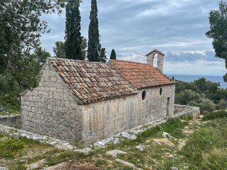HVAR, CROATIA, APRIL 2021 - Church of Our Lady of Kruvenica in Hvar, at the island of Hvar, Croatia. The church dates back to the 15th century, possibly earlier.