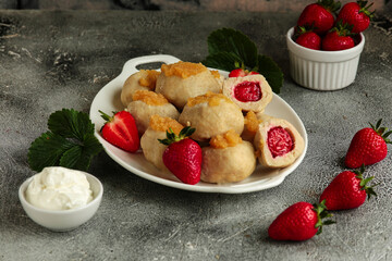 Dumplings With Strawberries. Delicious sweet dumplings are perfect for dinner and dessert.