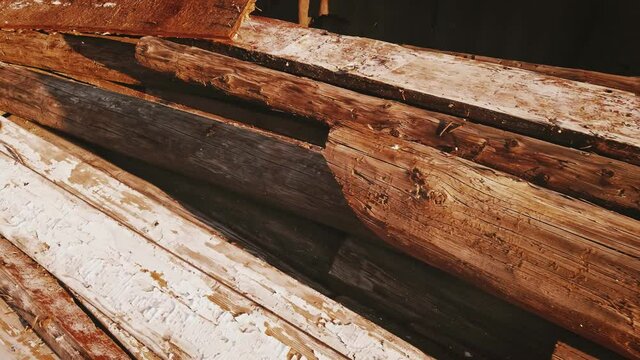 Worn wooden leftovers after building deconstruction in slums ghetto dolly.