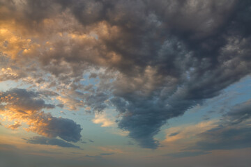 Sunset sky. Incredible colors of the evening sky with storm clouds.