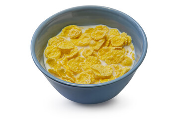 cornflakes with milk in a blue ceramic bowl isolated on white