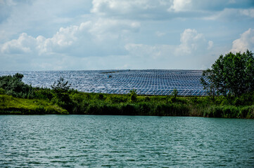 Photovoltaic power station, also known as a solar park, solar farm, or solar power plant is a large-scale photovoltaic system (PV system) designed for the supply of merchant power into the electricity