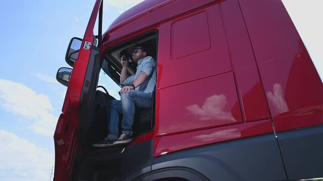 Professional Trucker Driver in Semi Truck Cabin