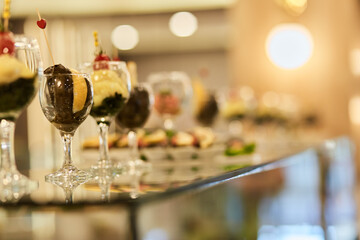 Vegetable snacks with seaweed for picking up from buffet for hotel system of all-inclusive. Vegetables stew with greenery