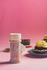 Sprinkles and chocolate cupcakes with buttercream