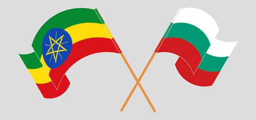 Crossed and waving flags of Ethiopia and Bulgaria