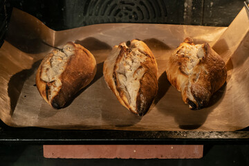 Making craft yeast-free bread in a home oven, on the baking stone