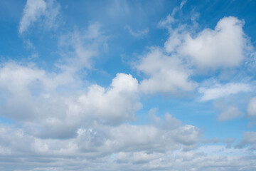 White clouds in a blue sky. Nature background